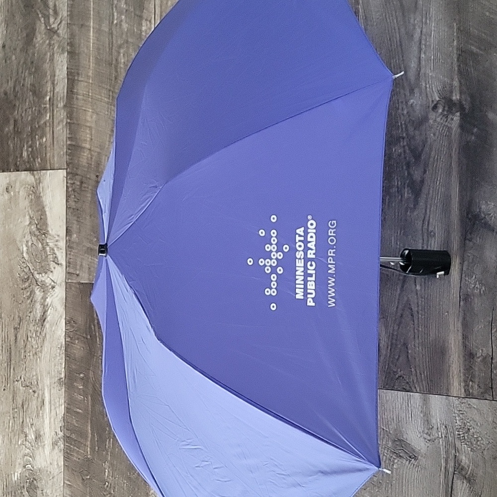 Umbrella With MN Public Radio Emblem.  Push Button Open Great Condition.